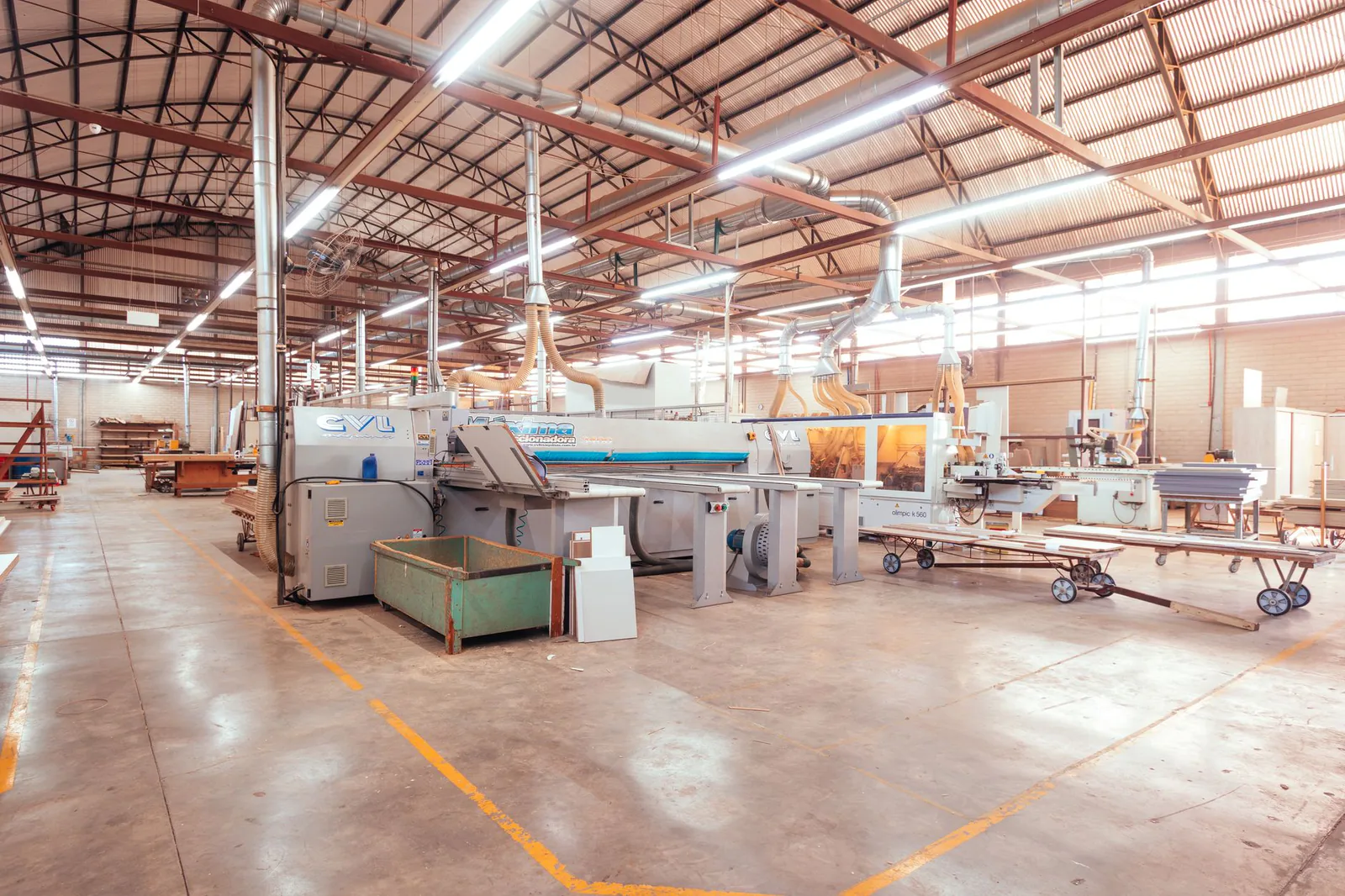 Large industrial ceiling fan in a manufacturing facility